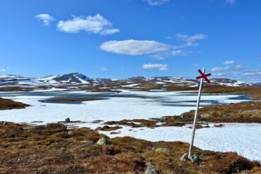icy blue lake in the mountains highlight of the wilderness road
