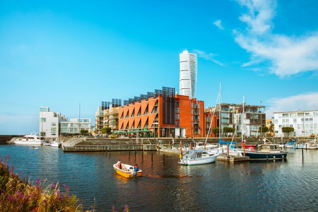 city by the water with boats