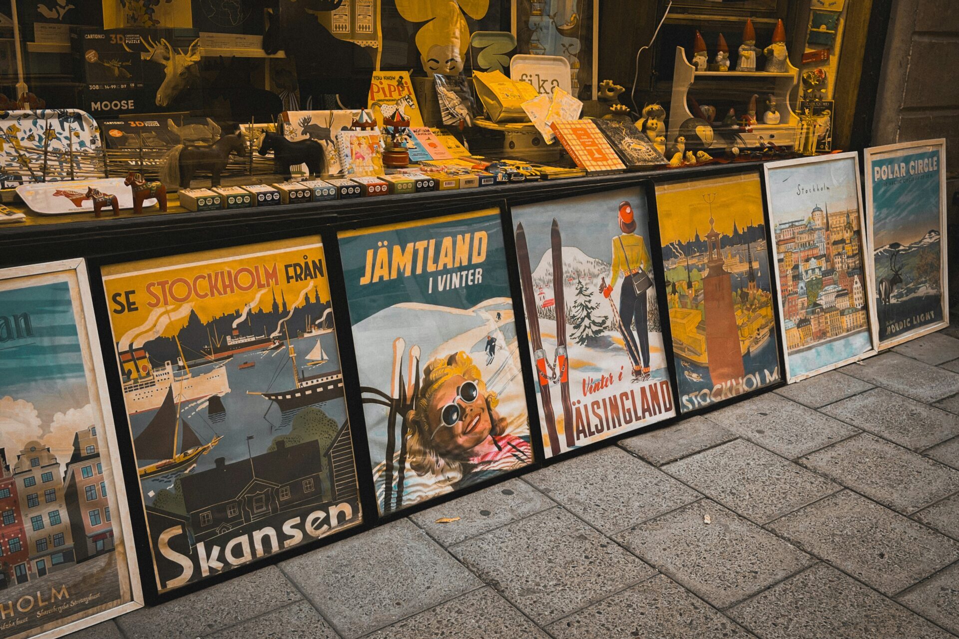 old school posters in front of a shop