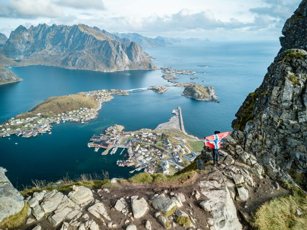 mountains and a village by the sea lofoten