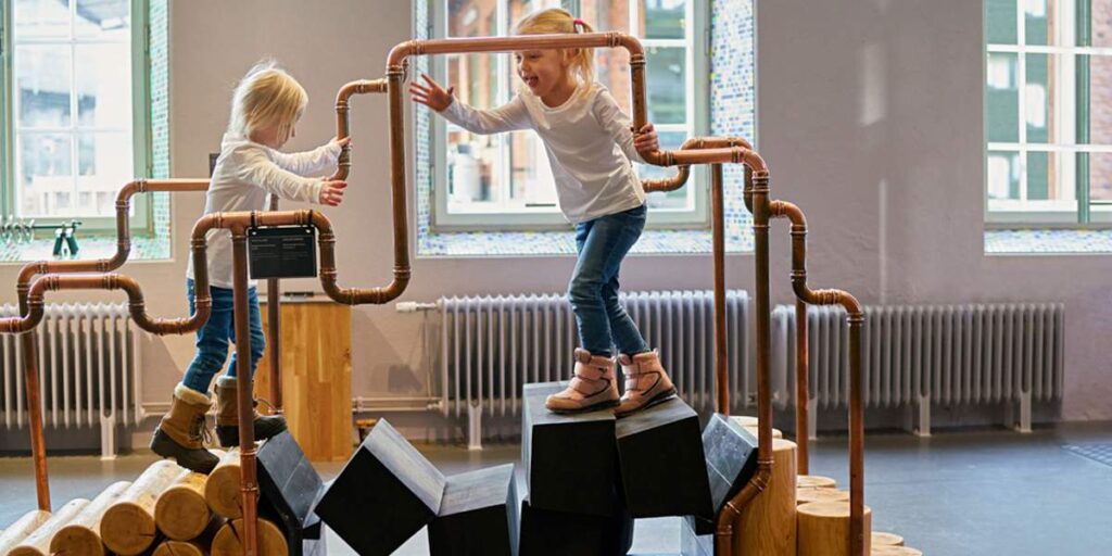 kids playing in indoor play pin